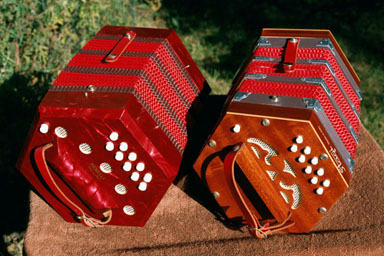 Side by side view of two Italian instruments